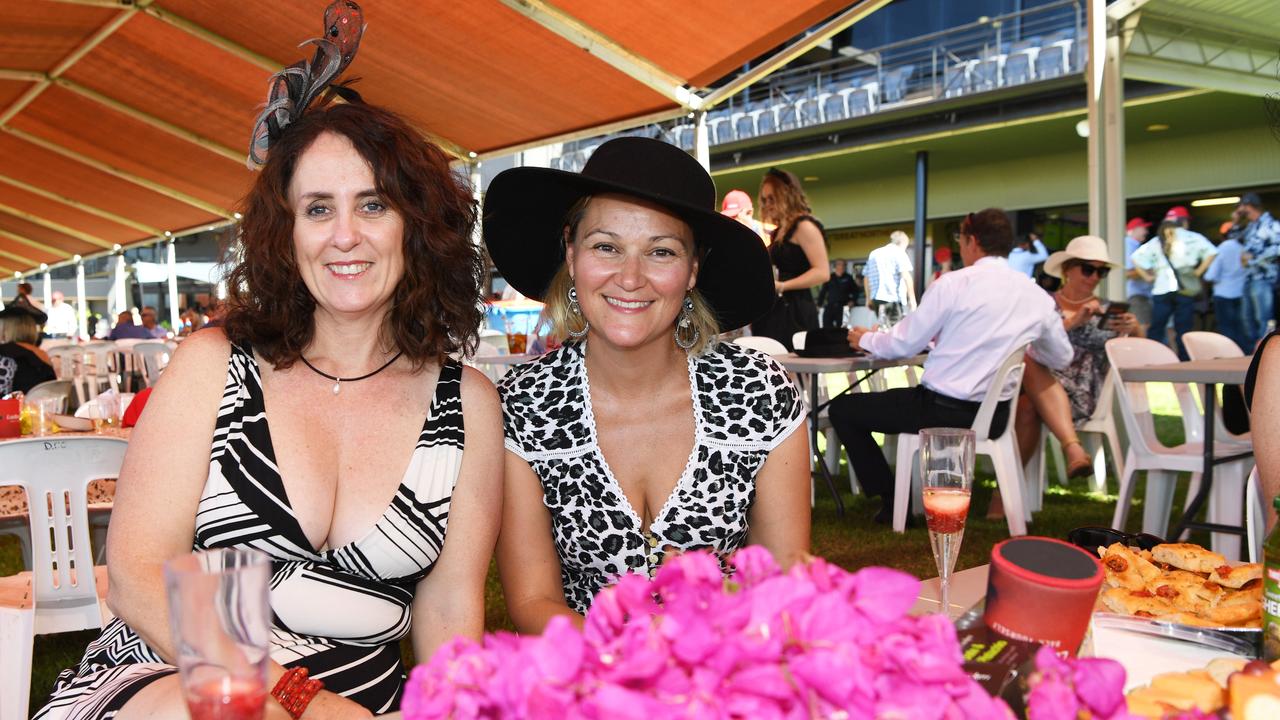 Jodi Maher and Amanda Hoepper at the Darwin Turf Club Bridge Toyota Ladies' Day / Derby Day. Picture: KATRINA BRIDGEFORD