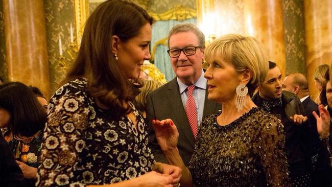 The Duchess of Cambridge and Foreign Minister Julie Bishop with Alexander Downer looking on at Buckingham Palace.