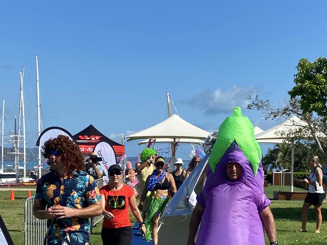 Competitors head off on the inaugural walkathon in Airlie Beach, organised by Whitsunday Triathlon Club to raise funds for Whitsunday Suicide Prevention Network.