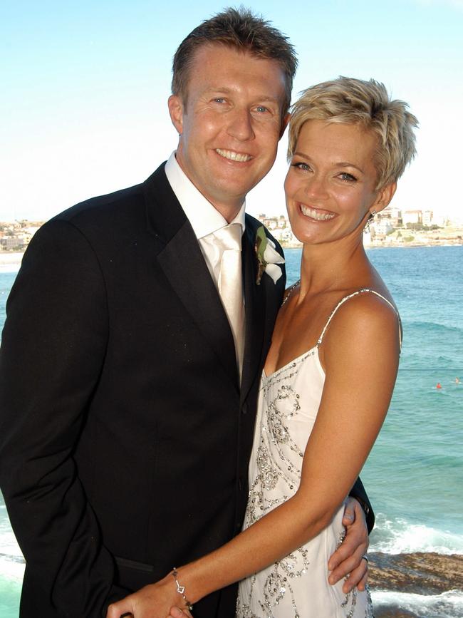 Jessica Rowe and Peter Overton on their wedding say at Bondi.