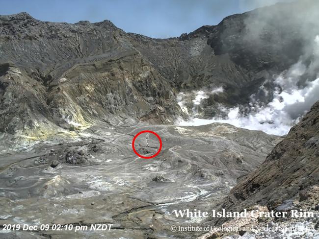 People could be seen inside the crater just before the eruption. Picture: GeoNet