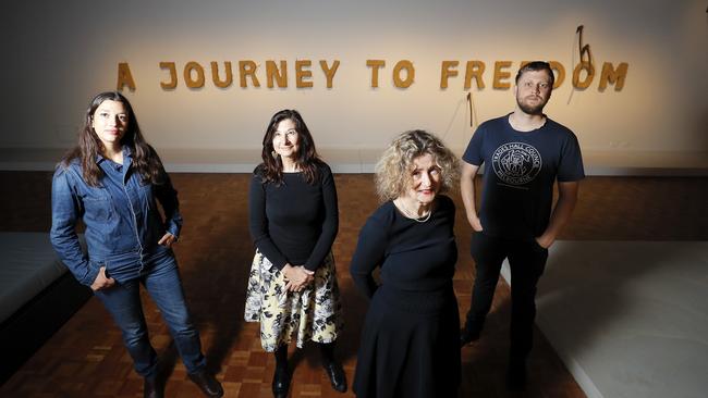 From left, artist Rachel Labastie, from France, co-curator and senior curator of art at TMAG Dr Mary Knight, guest curator Barbara Polla and artist Sam Wallman at the entrance to the <i>A Journey to Freedom</i> exhibition. Picture: RICHARD JUPE