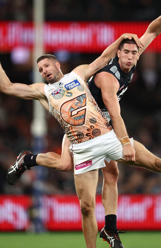 Jesse Hogan and Jacob Weitering go at it. Picture: James Wiltshire/AFL Photos