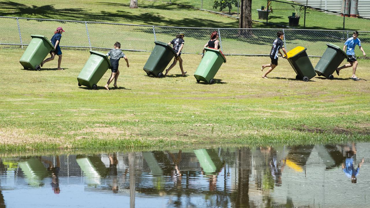 A wheelie bin race during Oakey Australia Day celebrations in Arthur Shooter Park, Thursday, January 26, 2023. Picture: Kevin Farmer