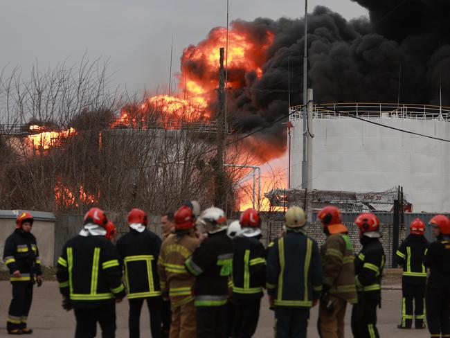 LVIV, UKRAINE - MARCH 26: Firefighters battle a blaze at an industrial facility after a Russian military attack in the area on March 26, 2022 in Lviv, Ukraine. Lviv Mayor Andriy Sadovyi issued an official statement that the explosion is 