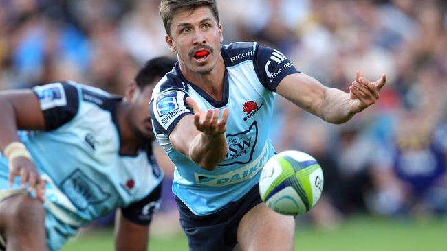 QUEENSTOWN, NEW ZEALAND - FEBRUARY 19: Jake Gordon of the Waratahs passes the ball during the Super Rugby trial match between the Highlanders and the Waratahs at the Queenstown Recreation Ground on February 19, 2016 in Queenstown, New Zealand. (Photo by Rob Jefferies/Getty Images)