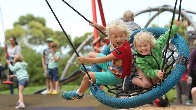 Liam,6, with his brother Conor ,4, playing at Bonython Park playground. Picture: Tait Schmaal