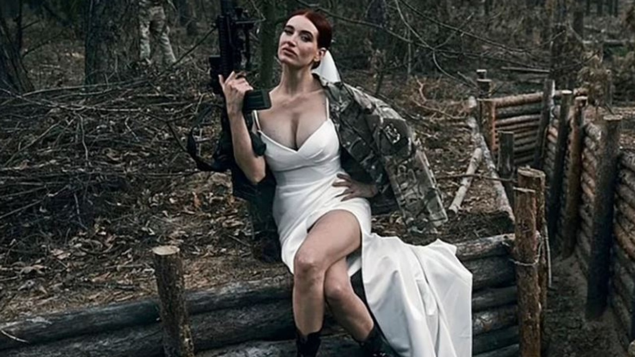 Ukrainian sniper Evgenia Emerald marries on frontline while wielding  machine gun | news.com.au — Australia's leading news site