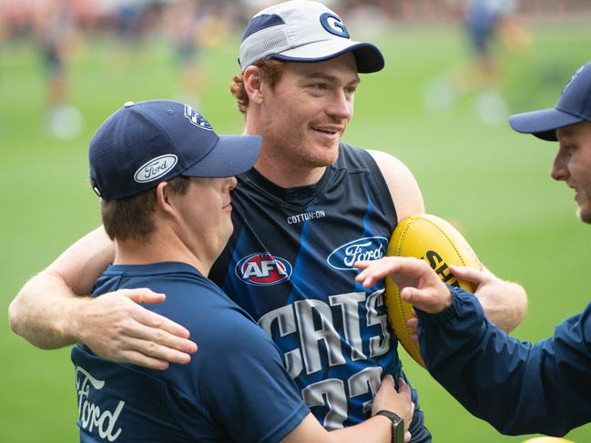 Gary Rohan has a hug with Sam Moorfoot. Picture: Brad Fleet