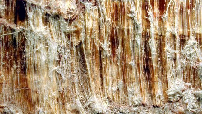 Asbestos being removed from a property.