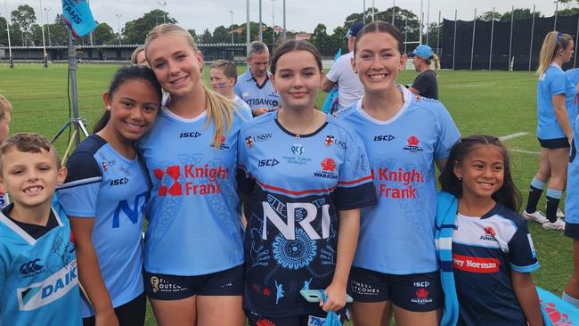 Waratahs players with young rugby fans. Picture: Supplied