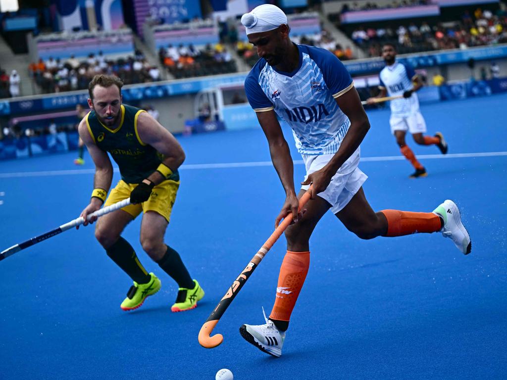 Mandeep Singh in control of the ball against Australia. Picture: Loic Venance / AFP