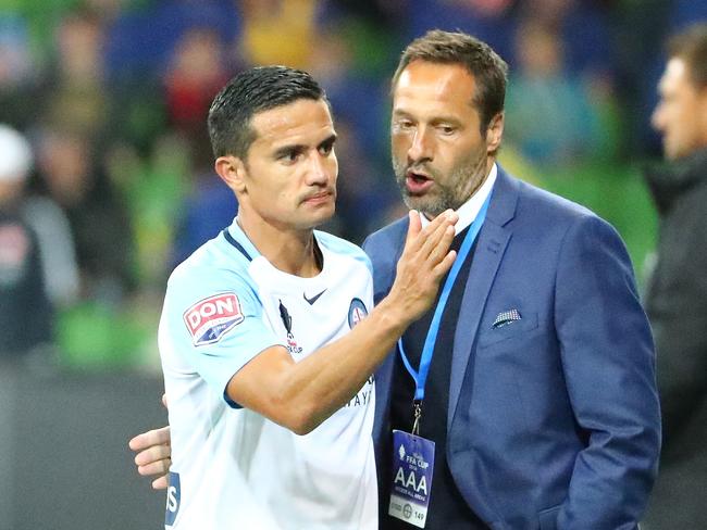 Tim Cahill, left, scored the winning goal in the 2016 FFA Cup final and was used cleverly by then coach John van 't Schip, right. Picture: Getty Images