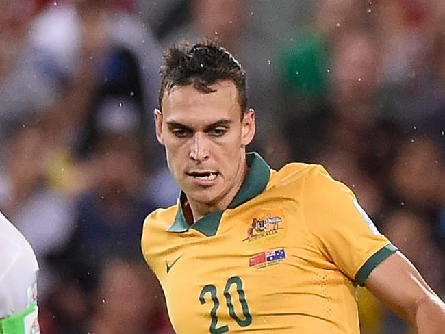 BRISBANE, AUSTRALIA - JANUARY 22: Trent Sainsbury of Australia passes the ball during the 2015 Asian Cup match between China PR and the Australian Socceroos at Suncorp Stadium on January 22, 2015 in Brisbane, Australia. (Photo by Matt Roberts/Getty Images)