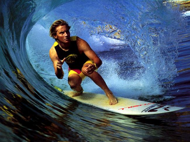 Surf legend Shane Herring (pictured at Dee Why point in 1994) tragically died after a freak fall inside his home. He struggled with addiction after crashing out of the pro tour