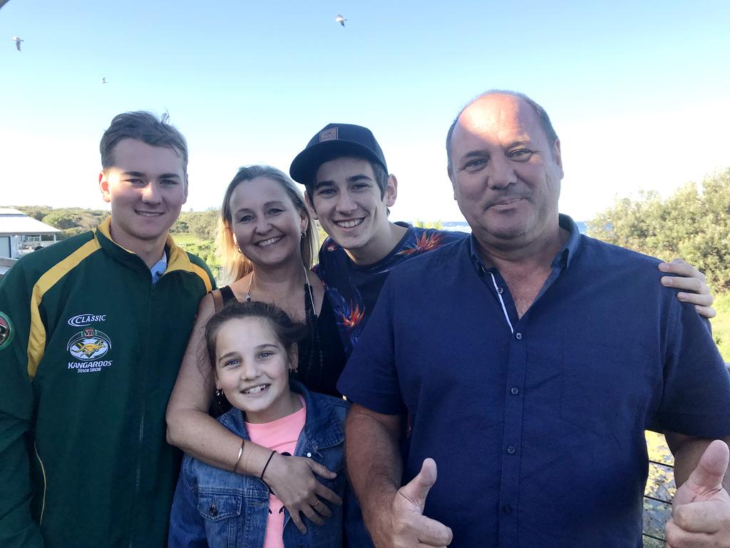 Sgt Brad Edwards pictured on right with his family L-R William, Emily, wife Jo and Charlie.