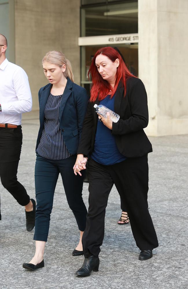 Debra Chambers (right) leaves Brisbane Supreme Court last April after her ex-husband pleaded guilty to manslaughter. Picture: AAP