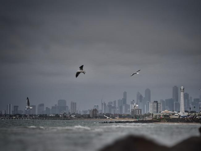 Dark clouds over Melbourne about 7.15pm on Australia Day. Picture: Tony Gough