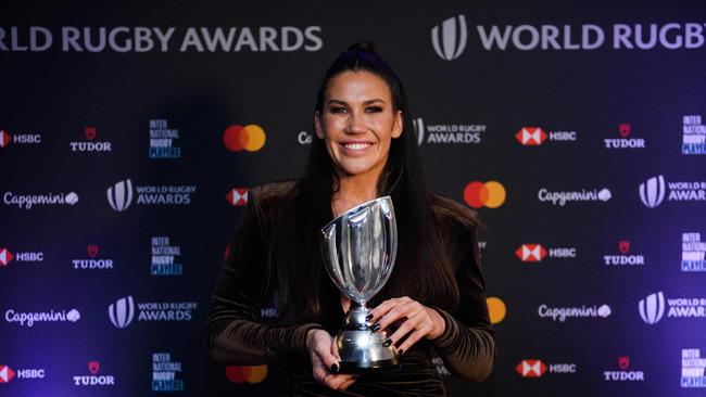 Caslick with her player of the year trophy. Picture: AFP