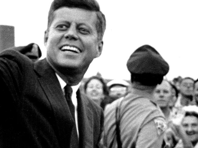 Shortly after his acceptance of the Democratic Party endorsement for President. Senator (and future US President) John F. Kennedy (1917 - 1963) and his wife, future First Lady Jacqueline Kennedy (1929 - 1994), smiles and waves from the back of an open-top car, Massachusetts, July 1960. (Photo by Paul Schutzer/The LIFE Picture Collection/Getty Images)Senator Kennedy returns home to Massachusetts after accepting the Democratic nomination in July 1960. Supplied to Penrith Press for American Visionary exhibition at Penrith Regional Gallery