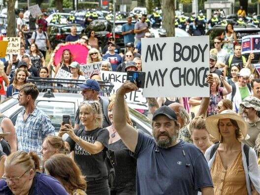 An anti-vaccination protest on St Kilda Road. Picture: David Geraghty