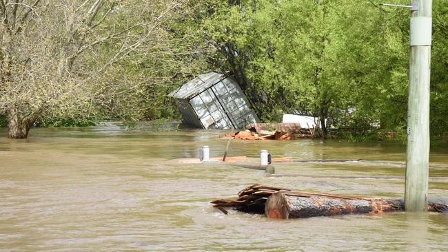 Shipping container washed away on Highland Lakes Rd, Deloraine. Tasmania floods 2022. Photo: Alex Treacy