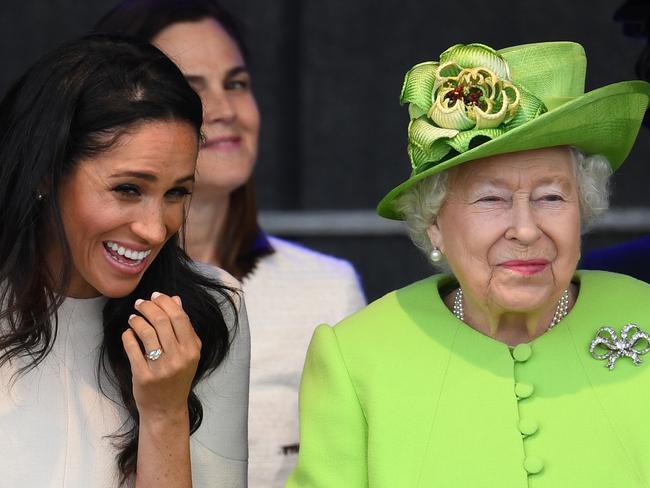 Meghan, Duchess of Sussex, laughs during a ceremony to open the new Mersey Gateway Bridge. Samantha Cohen is behind her. Picture: Getty