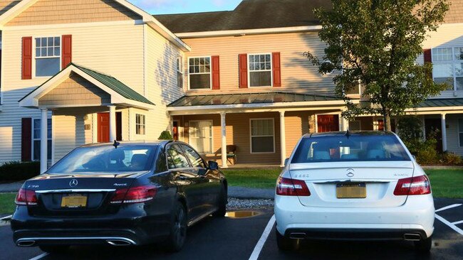 Two Mercedes Benz cars parked outside Paul Carter's house.