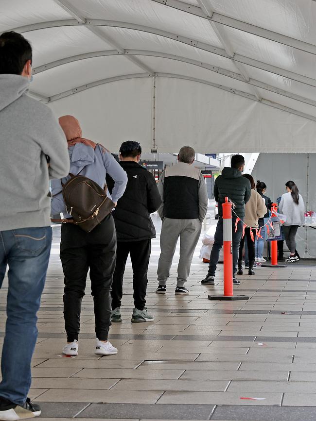 People queue to get Covid tests in Auburn Central, western Sydney. Picture: Toby Zerna