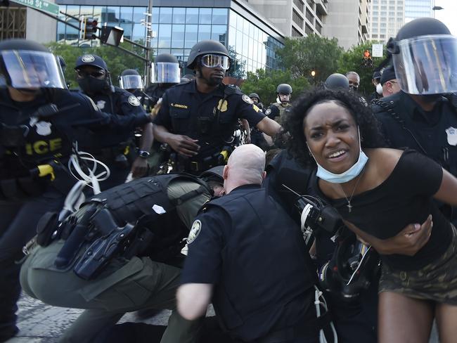 Protesters clash with police in Atlanta. Picture: AP