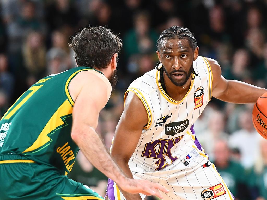 United recruit Ian Clark has plenty of experience taking on the Tasmania JackJumpers, as shown here when he played for the Sydney Kings. Photo: Steve Bell/Getty Images.