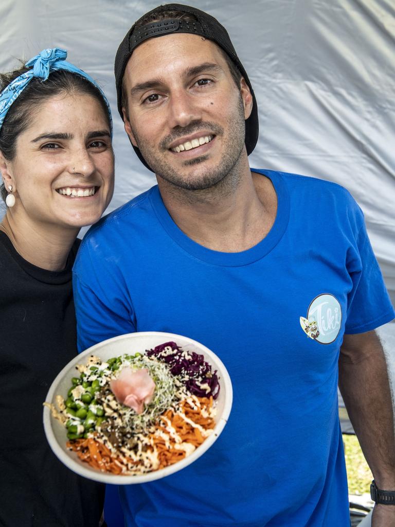 Rebecca Camigo and Paulo Silva with their Tiki fresh bowls at the Toowoomba Street Food Festival at Pittsworth. Saturday, January 29, 2022. Picture: Nev Madsen.