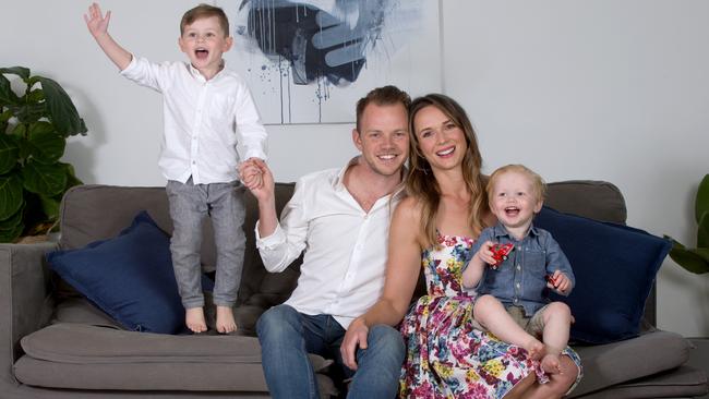 Actor and director Jeffrey Walker with wife Brooke Harman and sons Boston, 4, (left) and Ace, 2, at their home in Bulimba, Brisbane. Picture: AAP.