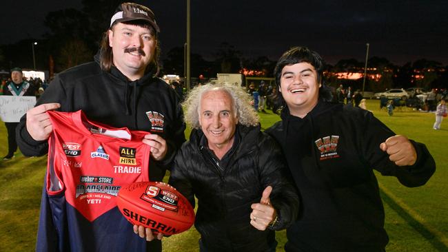 John Platten, centre, with Checkers, left, and Srey from Marmalade at the Biggest Game of Div 12 Ressies 2.0 at the Elizabeth Football Club. Picture: Brenton Edwards