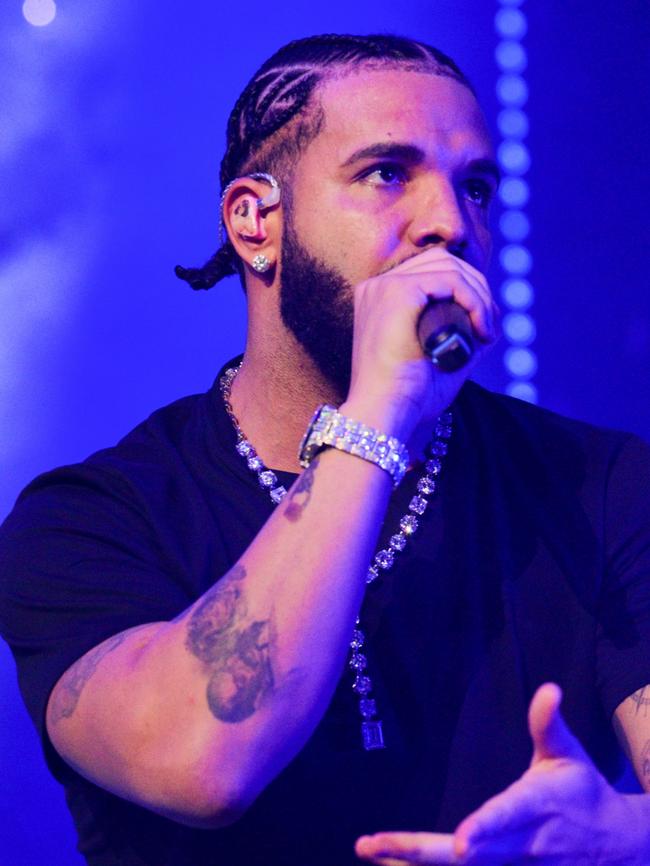 Drake is known for giving out money to fans during his concerts. Picture: Prince Williams/Wireimage