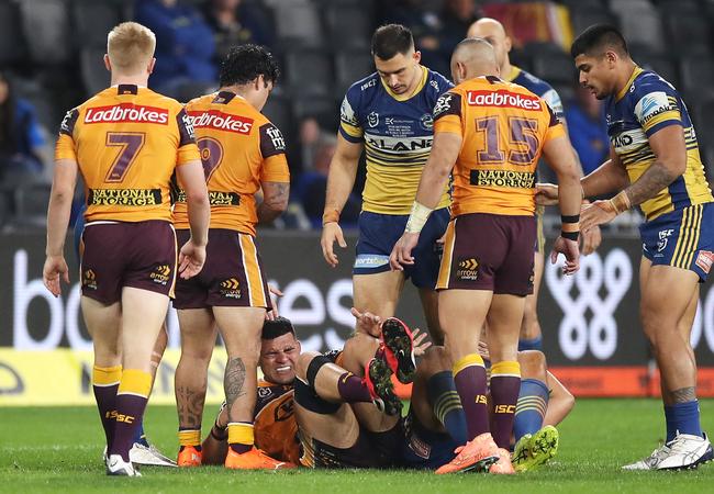 David Fifita of the Broncos is injured in a tackle during the round 19 NRL match between the Parramatta Eels and the Brisbane Broncos at Bankwest Stadium.