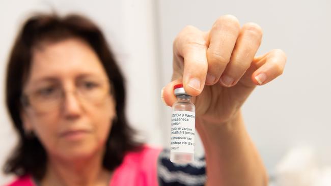 Authorised Nurse Immuniser at Grafton Base Hospital Roslyn Hollis with the AstraZeneca COVID-19 vaccine.