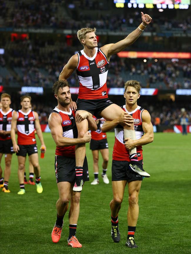 Nick Riewoldt chaired off after playing his 300th game. Picture: George Salpigtidis