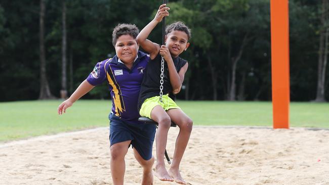 The rainy weather that Cairns experienced over the weekend is forecast to clear up, with fine and sunny or mostly sunny days for the rest of the week. Jykiele Burns, 8, pushes his cousin Sterling Four mile, 6, on the flying fox zip line at Todd Park in Bentley Park. Picture: Brendan Radke