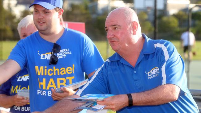 Michael Hart hands out how-to-vote cards at the polling booths Photo by Richard Gosling