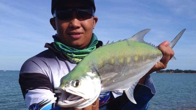 Carlo "Chonga" Esmaquel with a queenfish caught on a Rapala Flatrap