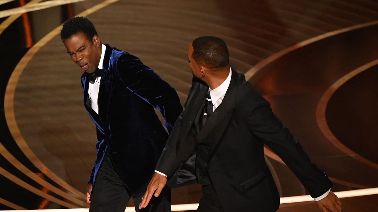 No more Mr Nice Guy: Will Smith slaps Chris Rock. Picture: AFP