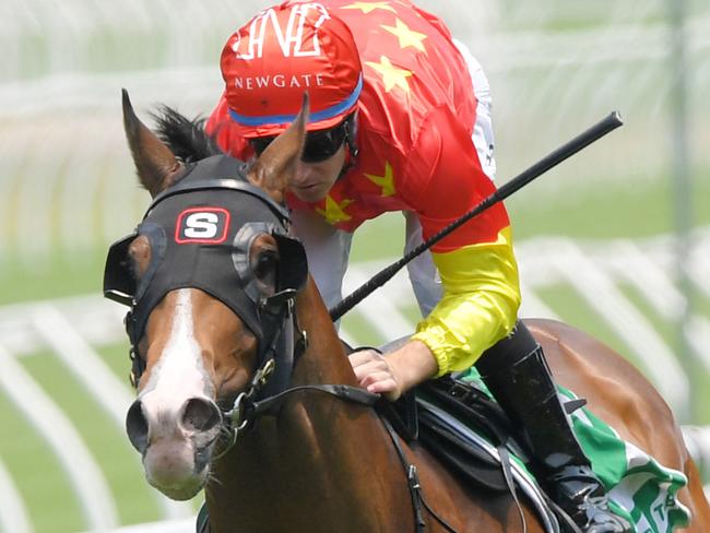 Jockey Tommy Berry rides Aim to victory in race 1, the TAB Venue Mode Handicap during Saturday Races at Royal Randwick Racecourse in Sydney, Saturday, December 21, 2019. (AAP Image/Simon Bullard) NO ARCHIVING, EDITORIAL USE ONLY