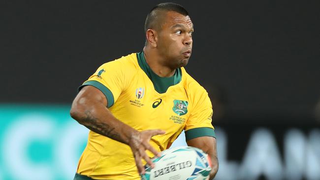 SAPPORO, JAPAN - SEPTEMBER 21:  Kurtley Beale of Australia offloads the ball during the Rugby World Cup 2019 Group D game between Australia and Fiji at Sapporo Dome on September 21, 2019 in Sapporo, Hokkaido, Japan. (Photo by David Rogers/Getty Images)