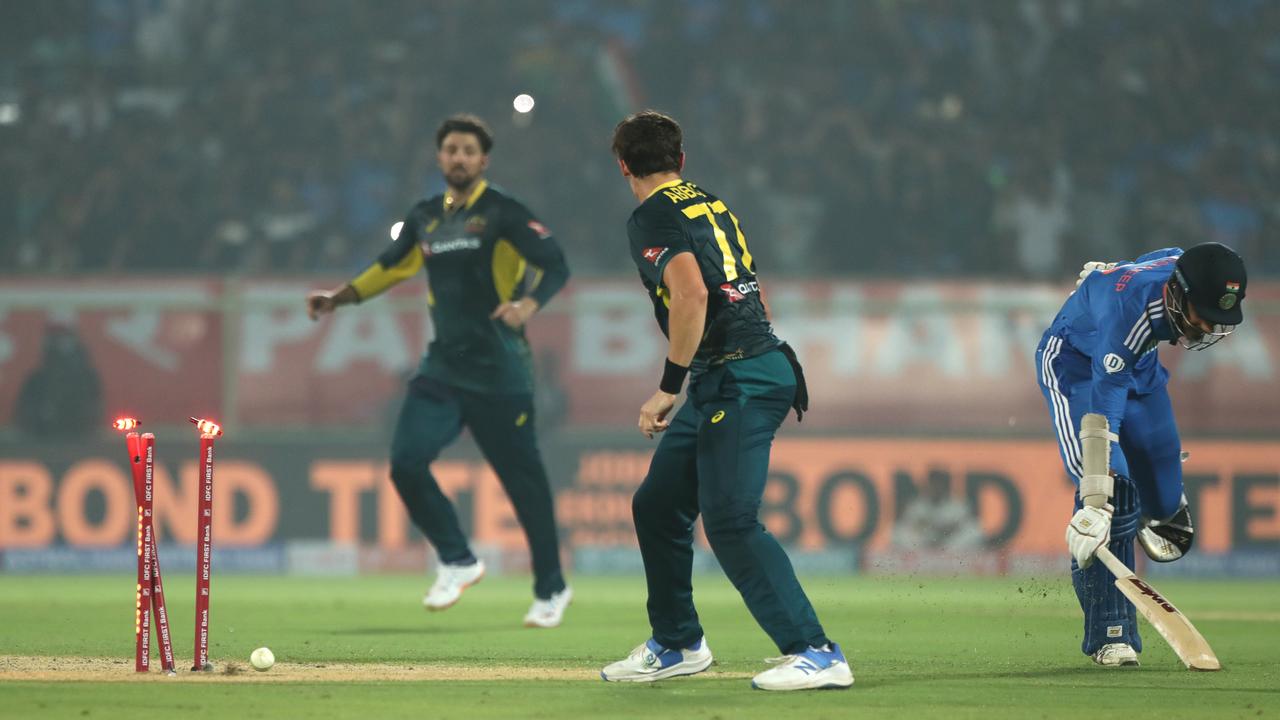 Abbott runs out India's Arshdeep Singh for the team hat-trick. (Photo by Pankaj Nangia/Getty Images)