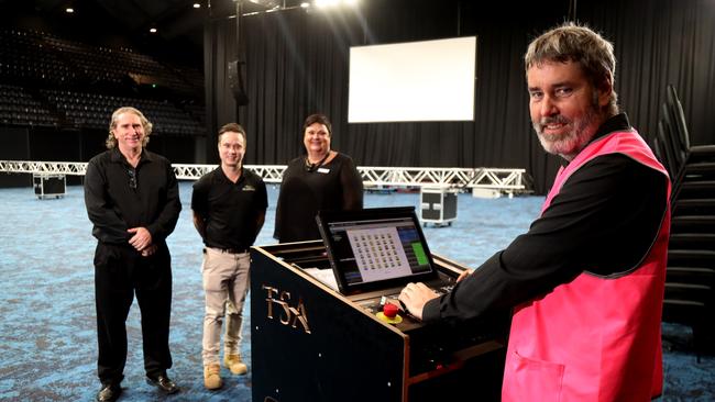 Cairns Convention Centre staff members audio visual technical manager Mark Kelso, IT manager Mark Doktor, national business development manager Cathy Taylor and audio visual operations co-ordinator Ian Southall in the refurbished arena. Picture: Stewart McLean