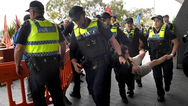 Police arrest an Extinction Rebellion protester earlier in the week. Picture: Tricia Watkinson