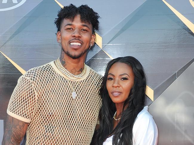 Nick Young and his partner on the red carpet