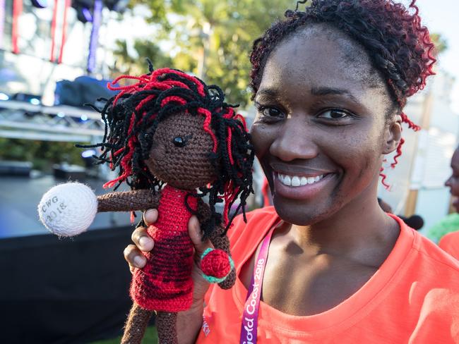 English netballer Ama Agbeze  with her crocheted likeness.