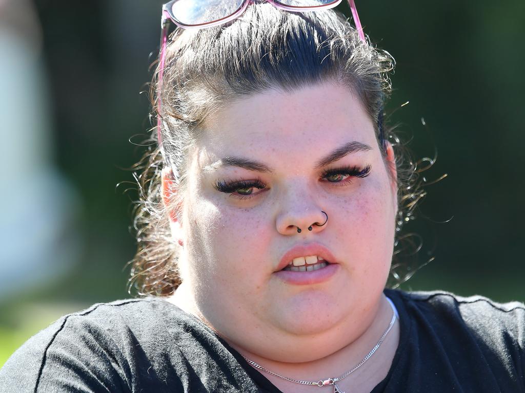 Friend Alicia Clark at the scene in Caboolture where a woman in her 20s was fatally stabbed overnight. Picture: John Gass